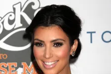 Kim Kardashian Battles Jimmy Kimmel In Diaper Changing Race
