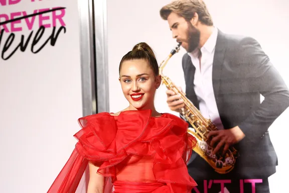 Miley Cyrus Attends ‘Isn’t It Romantic’ Premiere On Husband Liam Hemsworth’s Behalf